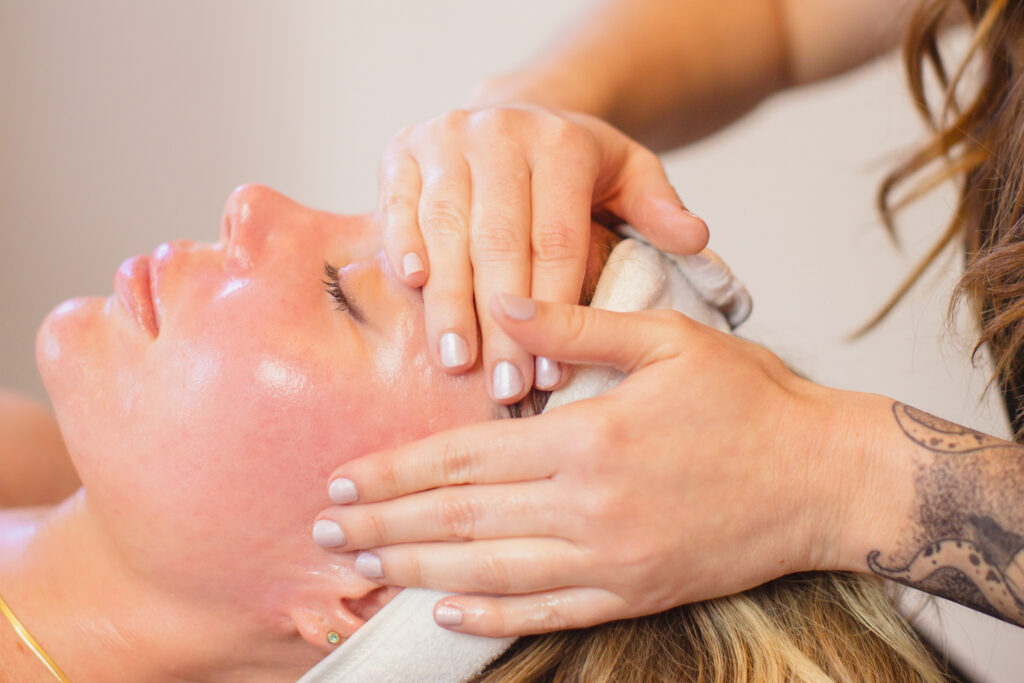 A relaxing facial massage session at Skyn Alchemy, focusing on rejuvenation and glowing skin.