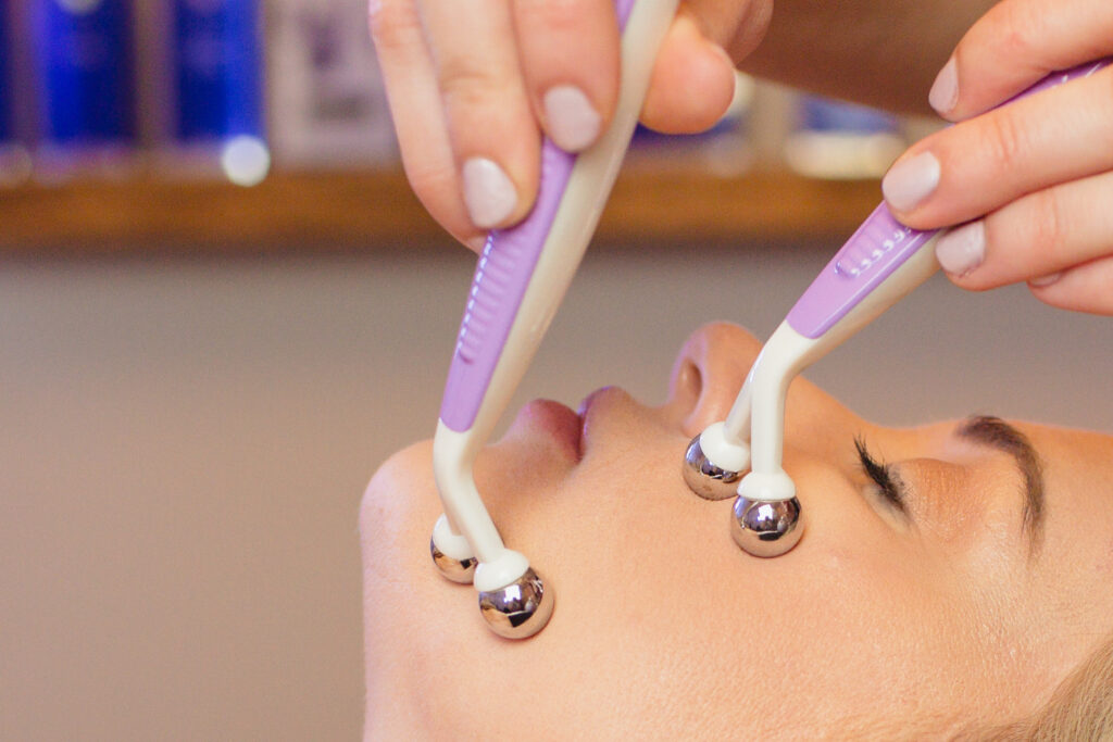 Close-up of a microcurrent facial procedure targeting skin rejuvenation.